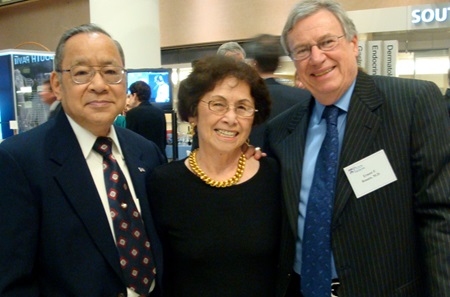 Mary Lau with her husband, left, and the late Ernest F. Rosato, MD, at a fundraising event.